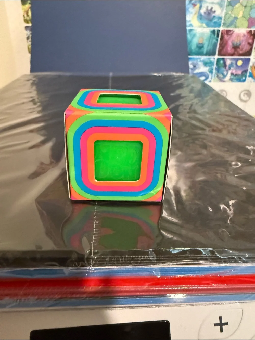 Neon Multi-Color Cube Toy with Bright Green Center